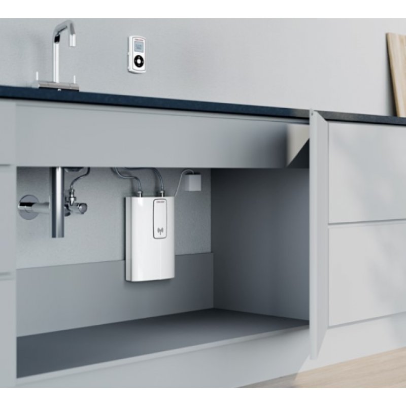 Stiebel Eltron DCE 11/13 RC Przepływowy ogrzewacz wody, podumywalkowy, trójfazowy, elektronicznie regulowany z pilotem, o mocy 11,2/13,5 kW Kod 230771 